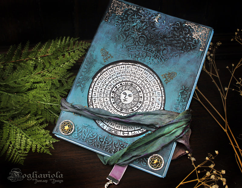 grimorio turchese sole e luna con luna e stelle